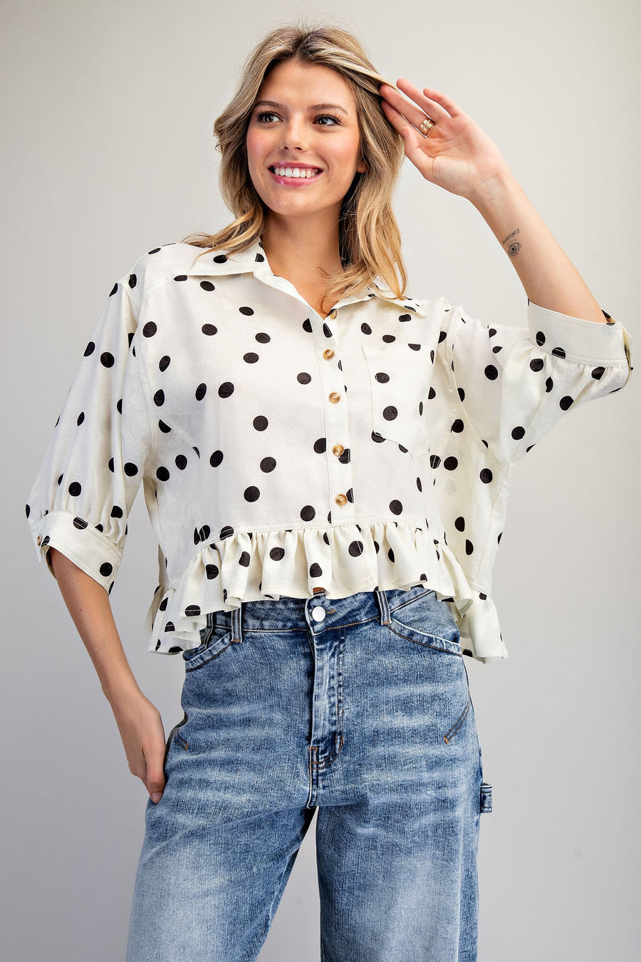 Tammie Polka Dot Jacquard Ruffle Hem Button Front Top