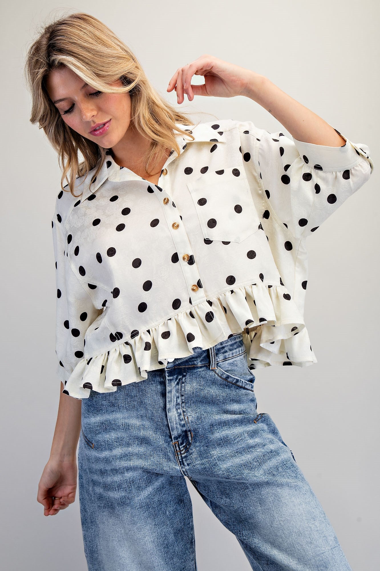 Tammie Polka Dot Jacquard Ruffle Hem Button Front Top
