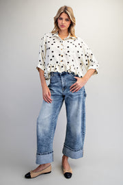 Tammie Polka Dot Jacquard Ruffle Hem Button Front Top