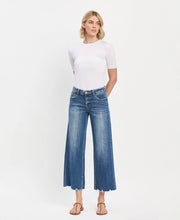 Bad Romance Mid Rise Ankle Wide Leg Distressed Hem Jeans