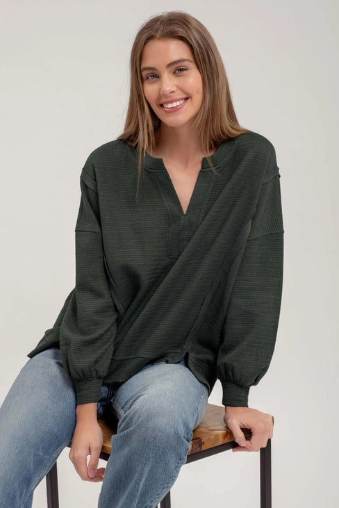 Truvy Split Neck Exposed Seam Long Sleeve Sweater Knit Top