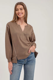 Truvy Split Neck Exposed Seam Long Sleeve Sweater Knit Top