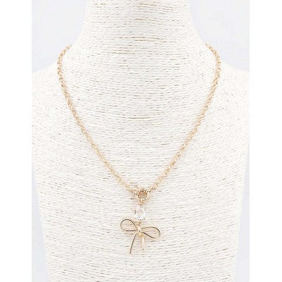 Meghan Browne Cane Gold Necklace with Clear Crystal and Bow Pendant