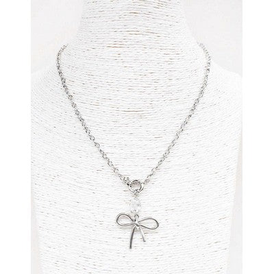 Meghan Browne Cane Silver Necklace with Clear Crystal and Bow Pendant