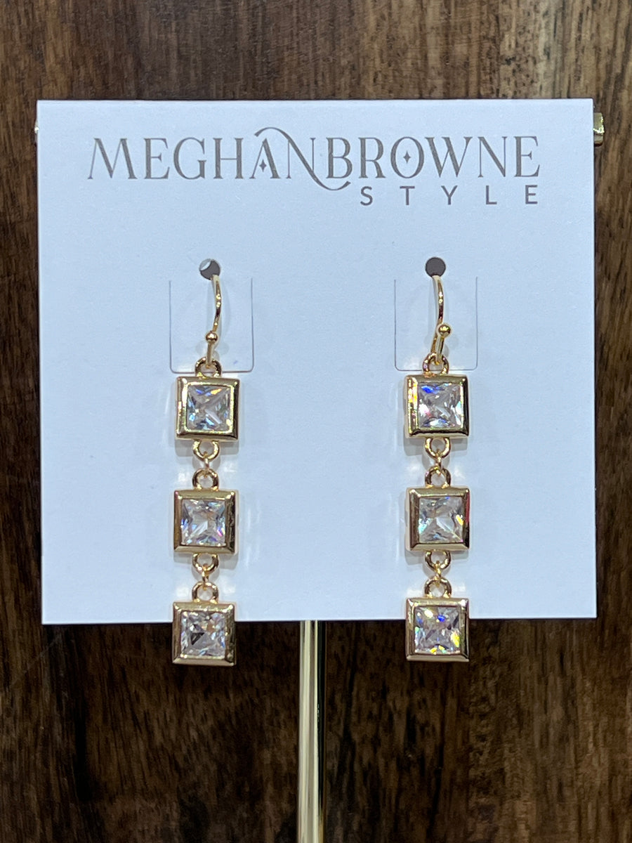 Meghan Browne Semi Gold Clear Three Stone Drop Earrings