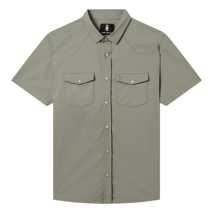 Go Everywhere Solid Pearl Snap Short Sleeve Shirt by Raised By Coyotes