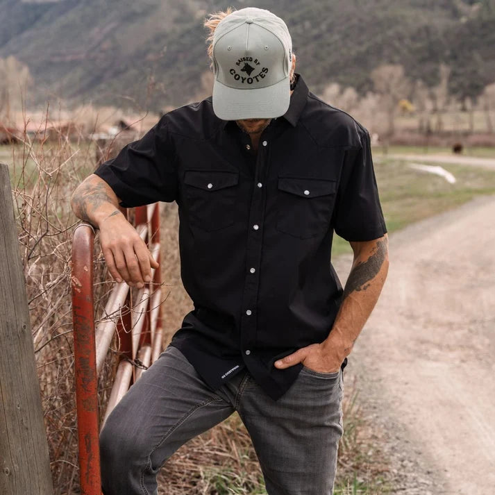 Go Everywhere Solid Pearl Snap Short Sleeve Shirt by Raised By Coyotes