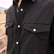 Go Everywhere Solid Pearl Snap Short Sleeve Shirt by Raised By Coyotes