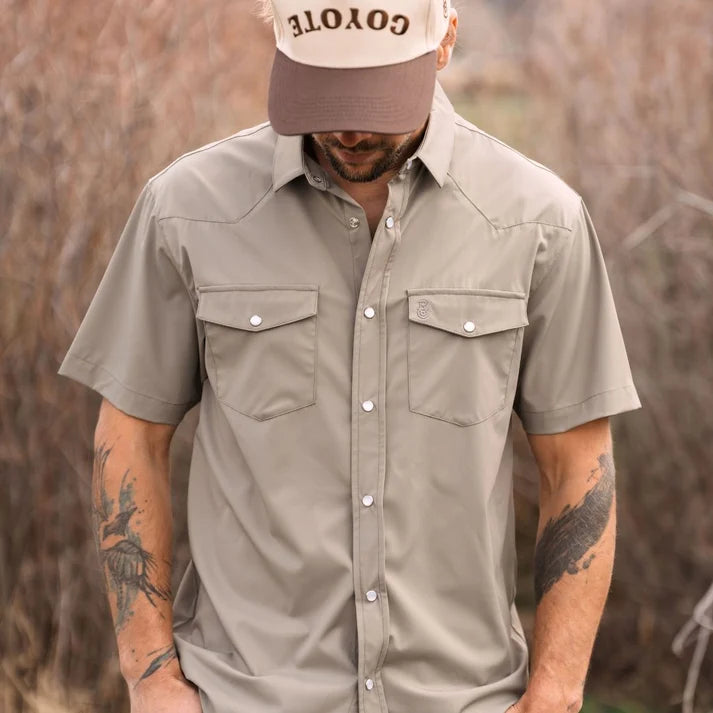 Go Everywhere Solid Pearl Snap Short Sleeve Shirt by Raised By Coyotes